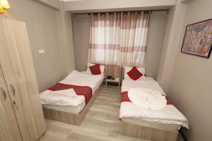 Lova arba lovos apgyvendinimo įstaigoje Bed and Pillow Hostel