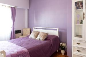 Una cama o camas en una habitación de Relax Tango BA - San Telmo