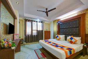 Postel nebo postele na pokoji v ubytování Hotel Re Pose Villa Near New Delhi Railway Station