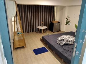 Postel nebo postele na pokoji v ubytování JOY HOSTEL