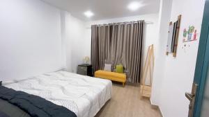 Postel nebo postele na pokoji v ubytování JOY HOSTEL