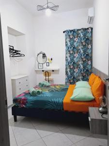 Posteľ alebo postele v izbe v ubytovaní Casa Miracoli 40
