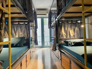Postel nebo postele na pokoji v ubytování JOY HOSTEL