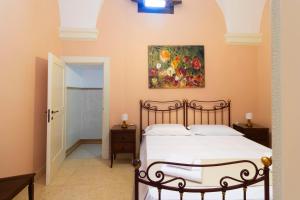 Letto o letti in una camera di Palazzo Insula