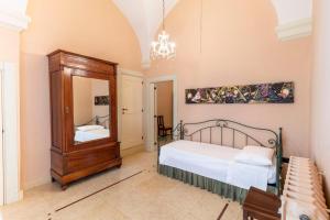 Letto o letti in una camera di Palazzo Insula