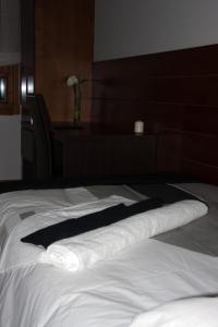 Posteľ alebo postele v izbe v ubytovaní Hotel Cuéntame