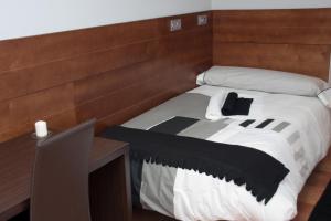 Posteľ alebo postele v izbe v ubytovaní Hotel Cuéntame