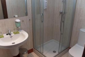 Kúpeľňa v ubytovaní Hotel Cuéntame