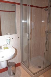 Kúpeľňa v ubytovaní Hotel Cuéntame