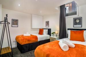 Ένα ή περισσότερα κρεβάτια σε δωμάτιο στο Sheena's 1 bed Home in Leeds