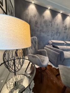 Posedenie v ubytovaní Apartman Pannonica Pin 0-24h