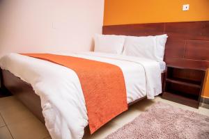 Blue Berries Hotel客房内的一张或多张床位