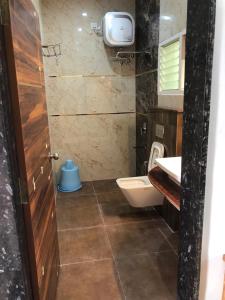Koupelna v ubytování Riverside Resort Yelagiri