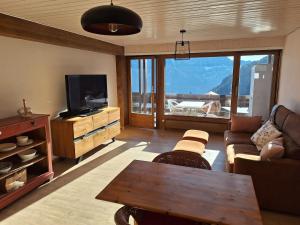 A television and/or entertainment centre at Charming apartment with great view