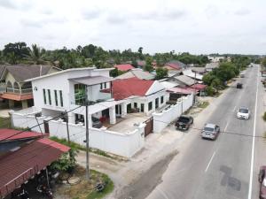 an aerial view of a street in a small town at Villa Aainaa Homestay in Pasir Mas