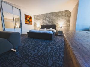 Postel nebo postele na pokoji v ubytování Hôtel Le Dormeur