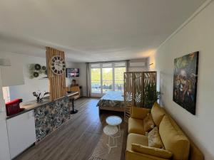 Posezení v ubytování Studio de charme au Gosier