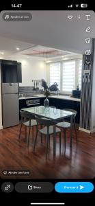 Η κουζίνα ή μικρή κουζίνα στο LE CARDINAL, appartement avec parking privé, gare, centre ville,