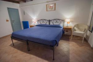 Postel nebo postele na pokoji v ubytování Agriturismo Casa Turchetti