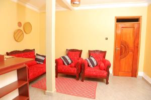 Area soggiorno di Kirungi Vacation Homes