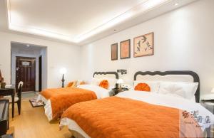 Postel nebo postele na pokoji v ubytování Su Man Designer River View Hotel宿漫设计师江景酒店重庆洪崖洞店 + 37 fotografií