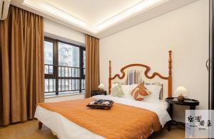 Voodi või voodid majutusasutuse Su Man Designer River View Hotel宿漫设计师江景酒店重庆洪崖洞店 toas