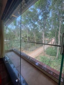Balkón nebo terasa v ubytování Riverside Resort Yelagiri