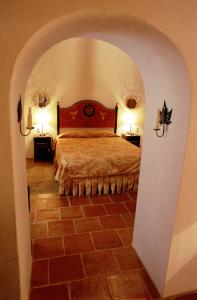 Łóżko lub łóżka w pokoju w obiekcie Monte dos Pensamentos - Turismo Rural