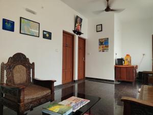 Posezení v ubytování Janatha Homestay
