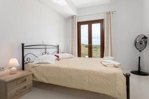 Voodi või voodid majutusasutuse One and only Villa at NAvagio Zakynthos toas
