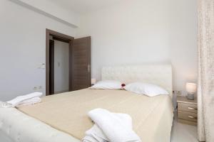 Voodi või voodid majutusasutuse One and only Villa at NAvagio Zakynthos toas