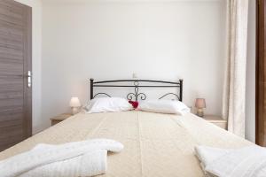 Voodi või voodid majutusasutuse One and only Villa at NAvagio Zakynthos toas