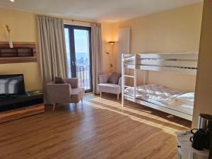 Postel nebo postele na pokoji v ubytování Haus Astenberg