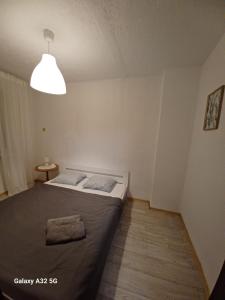Łóżko lub łóżka w pokoju w obiekcie Hel na wakacje