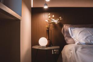 Postel nebo postele na pokoji v ubytování B&B Poli Opposti