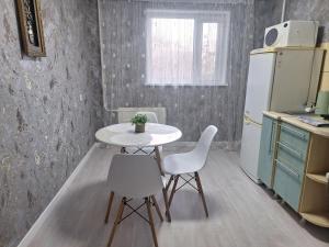 Kuchyň nebo kuchyňský kout v ubytování Машхур Жусупа 25