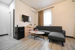 TV a/nebo společenská místnost v ubytování Mon Invite Hotel