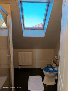 Kúpeľňa v ubytovaní Zita Apartman + 15 fotografií