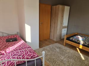 Postel nebo postele na pokoji v ubytování Ferienwohnung Dippoldiswalde