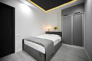 Postel nebo postele na pokoji v ubytování Mon Invite Hotel