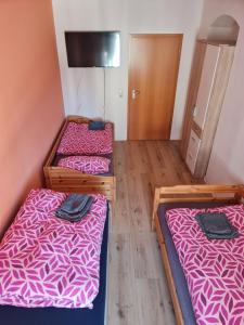 Postel nebo postele na pokoji v ubytování Ferienwohnung Dippoldiswalde