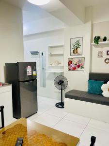 TV/trung tâm giải trí tại RiverBay 2 BR Apartment Naga City
