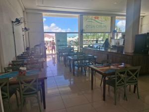 Restoran atau tempat lain untuk makan di Muro Alto Condomínio Clube