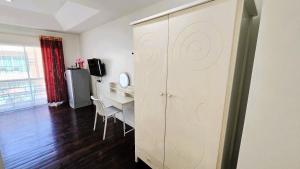TV a/nebo společenská místnost v ubytování Sea Boss Homestay
