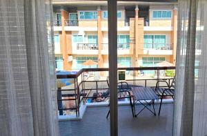 Balkón nebo terasa v ubytování Sea Boss Homestay