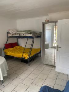 a room with two bunk beds and a mirror at YLt333 in Créteil +34 photos