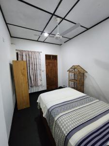 Ένα ή περισσότερα κρεβάτια σε δωμάτιο στο Emily's place in unawatuna +46 φωτογραφίες