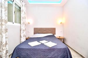 Giường trong phòng chung tại Luxury Suites Fuengirola 2 +30 ảnh