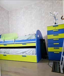 Postel nebo postele na pokoji v ubytování Casa GopNa