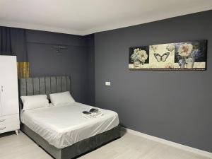 Postel nebo postele na pokoji v ubytování Arena Resort Otel Kagıthane